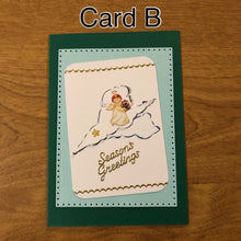Load image into Gallery viewer, Season&#39;s Greetings, Angel Cupid on a Cloud Christmas Card, Handmade Choice of One or Both Cards