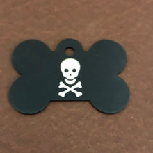 Load image into Gallery viewer, It is a large black bone aluminum tag with a skull and bones on it. The Tag measures approximately 1 9/16&quot;W x 1 1/16&quot;H.