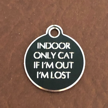 Small Hi-LITE black circle tag that says: Indoor only cat If I'm out I'm lost. All engraved in capital letters.